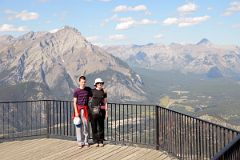 24 Peter Ryan and Charlotte Ryan With Banff Below Cascade Mountain, Mount Astley, Mount Aylmer From Banff Gondola Sanson Peak Observation Point In Summer.jpg